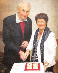 Jack Beatte and Valerie Agnew cut the anniversary cake