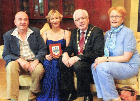 The Mayor of Lisburn, Councillor Allan Ewart with Nic Russell and her parents John and Patricia Russell.