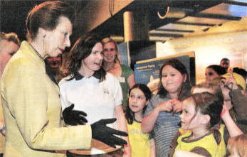 Members of the 1st Moira Brownies greet the Princess Royal at W5 in the Odyssey, Belfast at the 25th Anniversary celebration of WISE campaign.