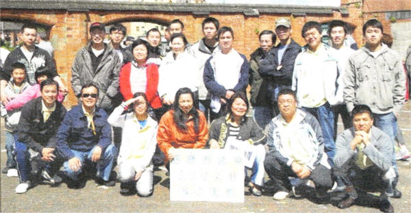 The Lisburn Ladies Chinese Group who won the dragon boat race, with their supporters.