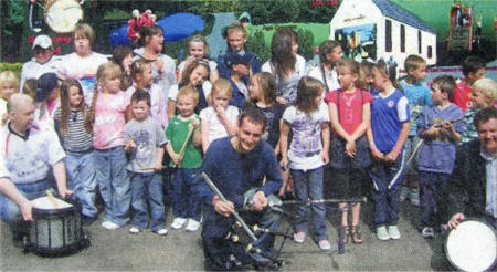 Kids and musicians who took part in the recent Seymour Hill and Conway Community Network Ulster Scots Summer School.