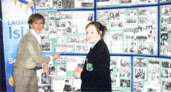 Emma Beattie (6th Form Pupil) helps Miss Storey (Head of Art and Design) to put together a display of photographs over the last 50 years.