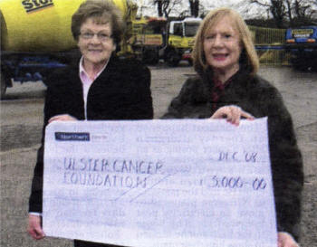 IL-R) Florence Leckey from Stoneyford Concrete presenting a cheque to Patricia Liesching, Development Officer, Ulster Cancer Foundation