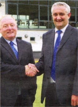 Drew Campbell (Men's 1st XI Head Coach), with William Brown, Lisnagarvey Chairman.