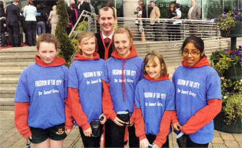 Deputy Mayor, Alderman Edwin Poots, with City of Lisburn Athletic Club who took part in the event