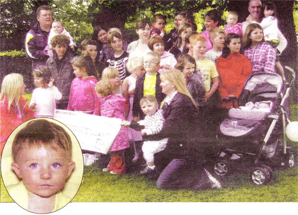 The group that took part in the two mile walk for Children's Hospice and left, Mark Stanford.