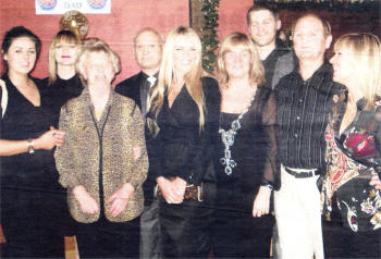 A photo of the Salmon family at a recent get-together. Left to Right: Naomi and Lara (Zoe's sisters) Margaret and Bertie Salmon (Zoe's aunt and uncle), Zoe Salmon, Heather Salmon Wilson (Zoe's cousin), Julian (Zoe's brother), Joe and Priscilla (Zoe's Mum and Dad). Family not in photo, Tamasin and Ian Wilson (Heather's husband and daughter). 