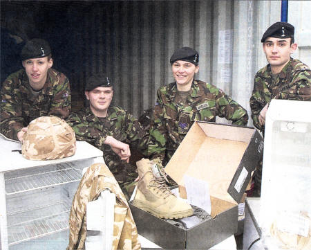 L-R Signaller Jennifer Knowles, Lance Corporal Matthew Kimber, Sgt Nat Whelan, and Signaller David Guest. US0909-