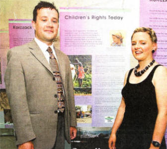 Councillor David Archer, chair of the Leisure Services department, and Vicky Johnston, from the Young At Art organisation, looking over a new exhibition entitled Champion of the Child at the Island Arts Centre. US2609-559cd