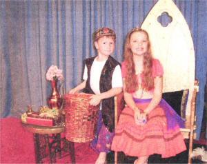 The Snake Charmer wins the heart of the princess in the Lower Primary play.