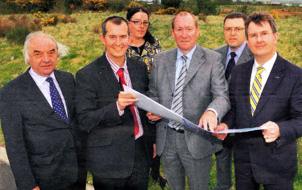 L-R Brian Snoddon, Edwin Poots MLA, Fiona Boyd of Killultagh, Sam Harris Director of Snoddons, Richard Steenson of Killultagh and Jeffrey Donaldson MLA look over the Development Framework document which has been signed off by the Planning Service. Photo by Aaron McCracken/Harrisons