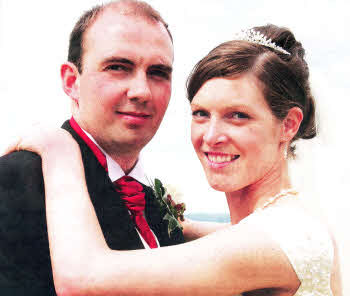 Alan and Caroline pictured in July at their wedding. Pic by Sara Dalzell Photography.