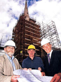 John Humes, Glebe warden, Canon Sam Wright, rector, and Paul Duggan, Glebe warden, examine plans for Lisburn Cathedral as a major restoration project gets underway. US2010-542cd
	
