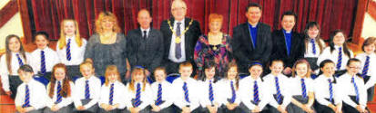 Central Primary School Choir.. Included are L to R: Heather McCloskey (Conductor and Accompanist), Ian Stewart (Acting Princlpal), Councillor Allan Ewart (Mayor), Denise Ewart (Mayoress) and Board of Governors members Rev John Brackenridge (First Lisburn) and Rev Paul Dundas (Christ Church). 