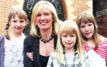 Former P4 teacher Yvonne Mackay with her daughters Caitlin, Megan and Erin at the service.