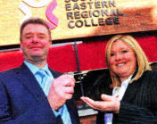 Gary Chambers, Contracts Manager and Sonya Smiley Project Manager at the handing over of keys for the new Lisburn campus.