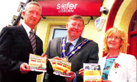At the launch of the Lisburn Crimestoppers Campaign are from left: Stephen McCracken Safer Lisburn, Deputy Mayor Cllr. Paul Porter and Susan Brew Regional Manager Crimestoppers
	