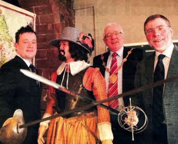 The Minister for Culture, Arts and Leisure, Nelson McCausland MLA is pictured at Lisbum's 17th Century Exhibition at the Irish Linen Centre and Lisburn Museum along with Chairman of the Council's Leisure Services Committee, Councillor David Archer and Mayor of Lisburn, Councillor Allan Ewart. The exhibition runs at the Irish Linen Centre and Lisburn Museum until 5th June 2010.
