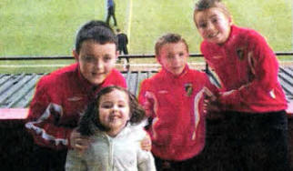 Adam and Jodie Fletcher and Adam and Brian Kerr at Glentoran. Adam Fletcher and Adam and Brian Kerr were selected to be mascots.