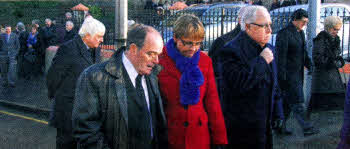 Margaret Ritchie, Minister for Social Development, SDLP South Down MP Eddie McCrady and Lisburn Councillor Bill Gardiner-Watson at the funeral of Councillor O'Hagan, 