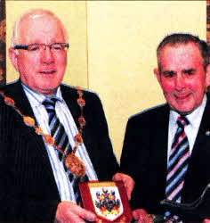 The Mayor, Councillor Allan Ewart, presents a gift to Harry Shortt, Chairman of Hillsborough 0ld Guard.
	
