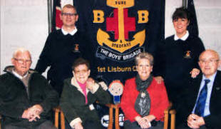Geoff Baird (Captain) with his parents Jim and Joan, and Denise Baird (Junior Section Leader) with her parents Billy and Marlene Braithwaite at the '100 Year Party' on Sunday December 13. Both Jim and Billy are former BB members.