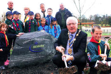 With the Mayor, Councillor Allan Ewart, are a group of beavers, cubs and scouts and (I-r) Mr Paul Clydesdale, Assistant District Commissioner and Project Leader; Mrs Margaret Irwin, Assistant District Commissioner; Mr Noel Irwin, District Commissioner and Mr Alan Poots, Capital Development Officer, Lisburn City Council.