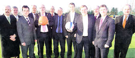 Lisburn City Council members and Councillors pictured with Members of Laurelhill Community College at Laurelhill Sportszone which has received a grant for new facilities. US0910.108A0