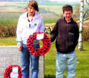 Aimee Kelly (Lisnagarvey) and Martin Nelson (St Patrick's) lay a wreath at the Ulster Tower.