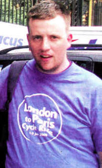 Christopher Coyle taking part in his last charity challenge when he cycled from London to Paris.
