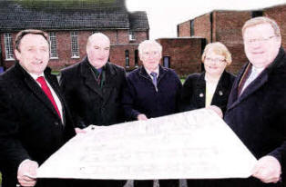 Eddie Weir, from ADP Architects; Rev David Boyland, rector of St Hilda's Church of Ireland; Bertie Brown, select vestry at St Hilda's; Cllr Margaret Tolerton and Jonathan Craig MLA looking over plans to replace the church building with a new care home. 