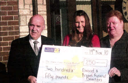 From left to right is: Fred Scott, Manager of Elwood Brown Funeral Directors, Grace Smyth, Community Fundraiser for Marie Curie and Barbara Kenwell of Elwood Brown.