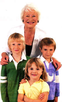 Olympian Dame Mary Peters will be on the front cover of BT's new phone book to celebrate two years to the start of the London 2012 Olympic and Paralympic Games. Appearing alongside the famous Olympian on the books that will be distributed across Northern Ireland in coming weeks is the sports mad Brennan family from Drumbo