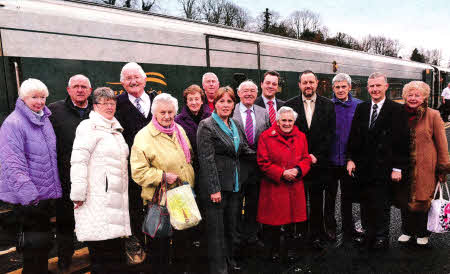 Pictured with Councillor Ronnie Crawford, Chairman of the Council's Planning Committee are fellow Councillors and members of the public awaiting the first 'Enterprise' train to arrive in Lisburn on December 13.