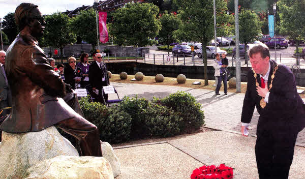 The Mayor of Lisburn, Alderman Paul Porter, lays a wreath at the foot of the Pantridge Memorial Statue during a recent ceremony in memory of Major Frank Pantridge.