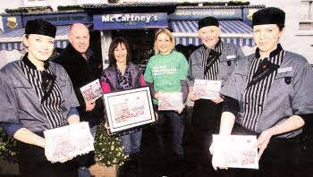 Sarah Price of McCartney's Butchers, Mark Megarrythe Borrow fruit and Veg shop, Christina Brown Artist, Macmillan Cancer Care Fundraising Manager Julie Campbell, George McCartney and Judith Millar of McCartney's Butchers launching the Christmas card designed by Christina in aid of Macmillan. US4410 103A0