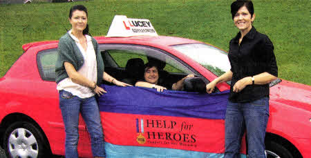 Pauline Lucey driving school (in car) who very kindly donated 10 driving lessons, with Alison Holdsworth (left) and David's sister-in-law Sharon Webb (right).