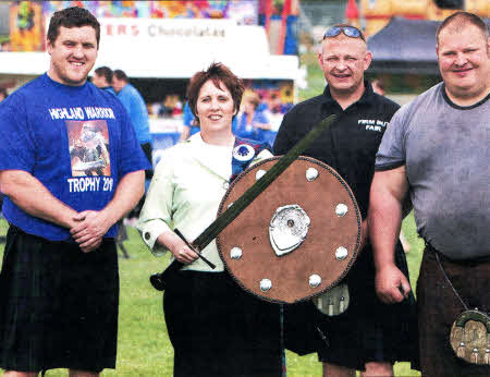 Councillor Jenny Palmer, Chairman of the Councils Economic Development Committee at the opening of the Highland Games along with Glen Ross co-organiser of the Games and Jonathan Kelly, current Highland Games Champion.