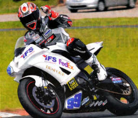 Ian Lowry celebrating the wln in the Supersport race.