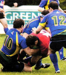 Lisburn bring this Ballyclare attack to an abrupt end wit tackle during the clash at Blaris last weekend.
