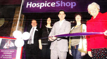 From left to right, NI Hospice Retail Manager Neil Fowler, Hospice Shop Manager Joanne Kain, Malachi Cush, Lisburn Shop Manager Rachel Bell and Chief Executive of the NI Hospice Judith Hilt open the new Lisburn Hospice Shop in Longstone Street. US4510105A0