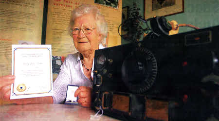 Mary Davis, who served in the RAF during the war as a code cracker. US2810-101A0 
