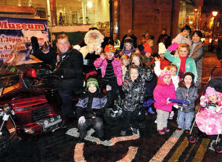 Young children eagerly awaited the arrival of Santa at the Irish Linen Centre and Lisburn Museum and were very glad to see him arrive with the Mayor of Lisburn, Alderman Paul Porter. Santa is helping the Mayor to raise money for his Mayoral Charity, 'Carers Forum on Learning Disability'.