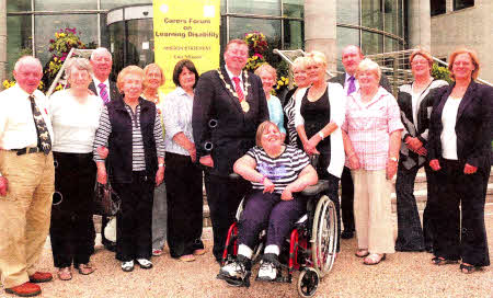 The Mayor, Alderman Paul Porter, with representatives from The Carers Forum on Learning Dlsablllty which has been named as the Mayor's Charity for the coming year.