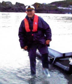 WELCOME T0 SCOTLAND---Mervyn steps ashore in Portpatrick after nearly eight hours crossing the North Channel in his bath