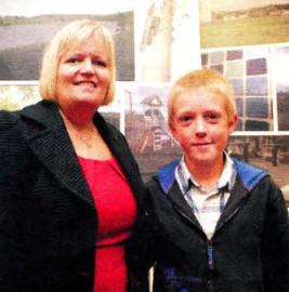 Sam Madden, 14, from Lisburn, receives the top short film prize from the Northern lreland Commissioner for Children and Young People, Patricia Lewsley. Sam produced a short film which conveyed some of the problems of play and leisure in Lisburn.
	