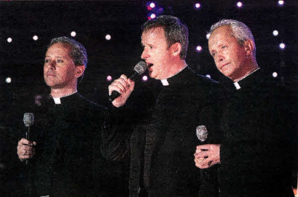 The Priests performing at this year's BBC Proms in the Park in Hillsborough with Fr David DeLargy in the middle.
