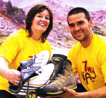 David Healy, Patron of TinyLife took time out of his hectic football training schedule to encourage the Northern lreland public to `Take a Hike for TinyLife' up Slieve Donard on Saturday September 11. He is joined by TinyLife Fundraising Manager Valerie Cromie