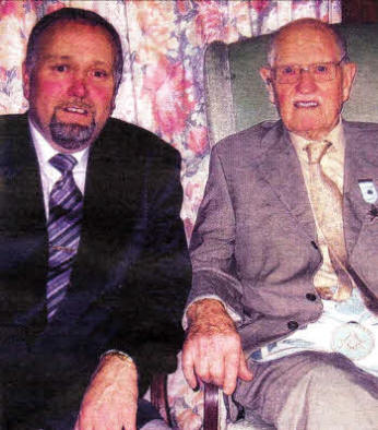 Tommy with his nephew Neil Gilmore when he received his 50 year medal from the Masonic.