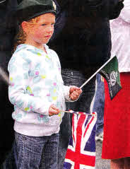 A young onlooker watches as the Royal Irish Regiment parades through Lisburn. US2111-564cd